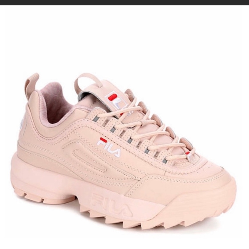 Peach colored fila shoes